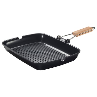 Black grill pan with wood handle, ribbed surface, foldable design for space-saving storage, ideal for various hobs including induction.
