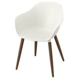 GRÖNSTA: white moulded chair with curved back and arms, wooden legs.