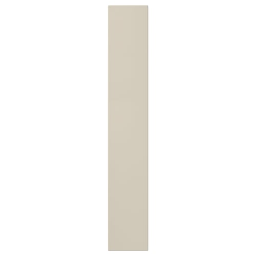 Beige HAVSTORP cabinet front, rectangle with smooth finish.