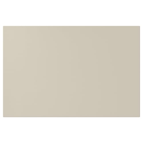 Beige HAVSTORP kitchen cabinet with smooth, rectangular design.