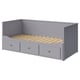 Gray HEMNES day-bed with drawers, wooden frame, upholstered base, rectangular shape, and vertical panel design.