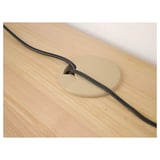 Wooden desk with built-in cable outlet, managing wires neatly.