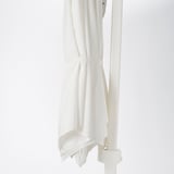 Hanging parasol with hook-and-loop strap for easy closure. Protects from uv rays with upf 25+ rating.