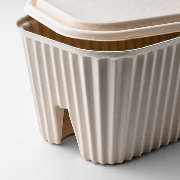 Beige HÖNSNÄT cable box, solid, ridged sides.