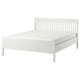 White IDANÄS bed with sleek, slatted headboard and footboard, clean lines, sturdy wooden frame, and elevated legs.