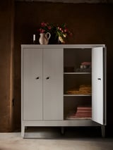 Modern cabinet, IDANÄS, light pink, metal, rectangular, minimalist design.