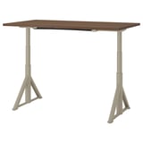 Brown IDÅSEN desk, beige legs, adjustable height.