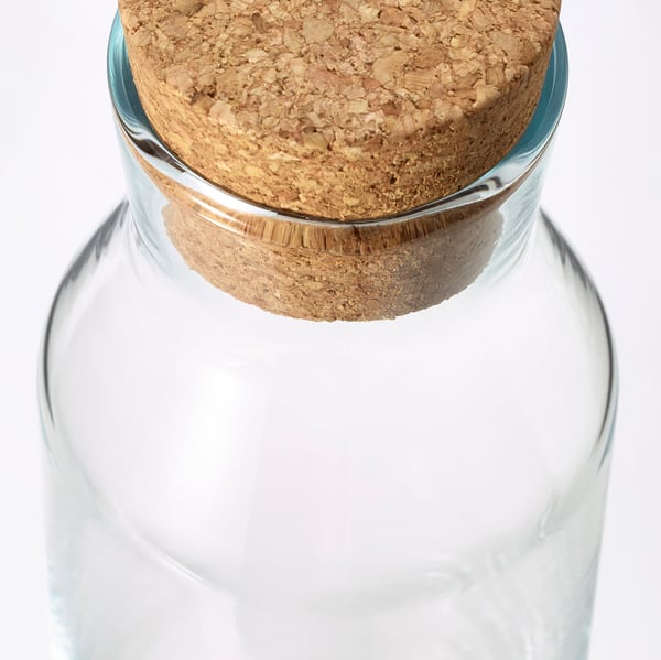 Clear glass carafe with cork stopper, robust, suitable for fridge.