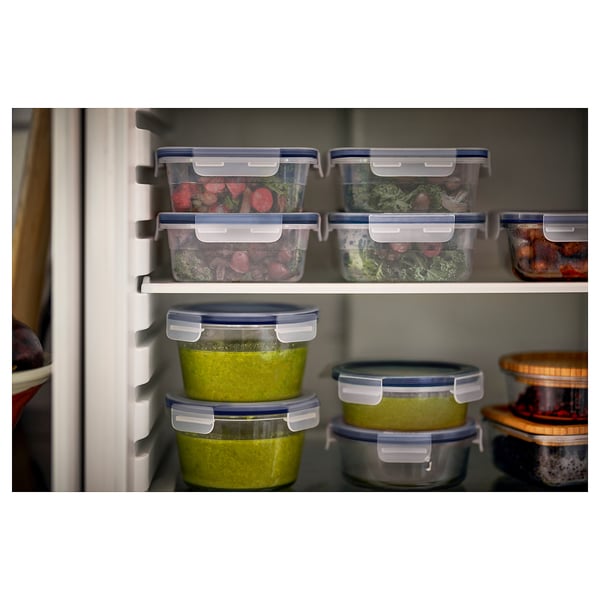 IKEA 365+ food containers, clear with blue lids, square and round shapes, organized in fridge.