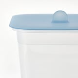 Clear plastic container with secure blue lid, designed to preserve food freshness.