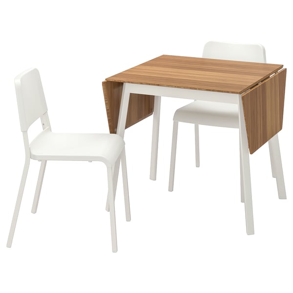 IKEA PS 2012 set a bamboo drop-leaf table with white legs and two white plastic chairs. Modern, compact, and stackable design.