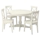 Round white dining set with pedestal table and four matching chairs.