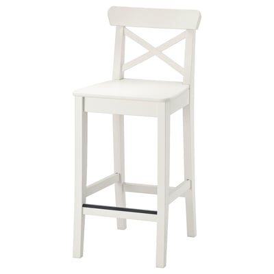 A white INGOLF barstool with a wooden frame and fiberboard seat and backrest, designed for comfort with a footrest.
