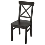 A black INGOLF chair with a high back, sturdy pine wood construction, and a woven seat. Its sleek, dark design adds a modern touch.