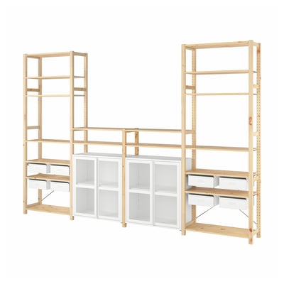 This image displays the IVAR storage system featuring light pine shelving with white mesh drawers and cabinets for versatile, customizable storage.