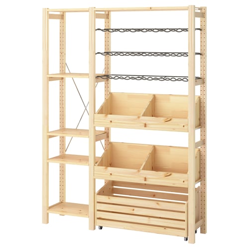 An IVAR wooden storage unit, light beige, with shelves, boxes, and bottle racks.