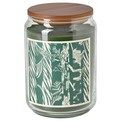 Green glass candle jar with wooden lid, pine forest design, natural scent.