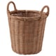 A KAKTUSFIKON, a tall, light brown, woven rattan plant basket with handles. It has a cylindrical shape and natural, rustic design.