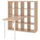 Light wood KALLAX desk unit with shelves, white legs, and angled top.