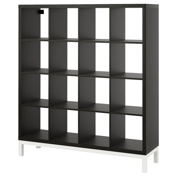 The KALLAX shelf is a black, square unit with multiple compartments, supported by white legs. Its design offers versatile storage with clean lines.