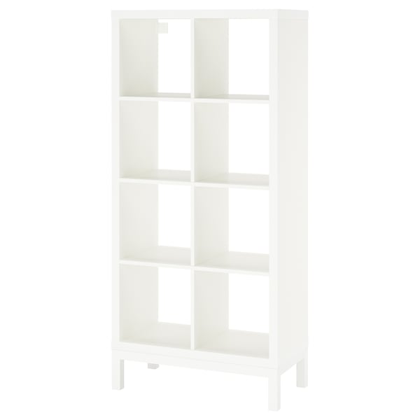 A white KALLAX shelving unit with multiple open shelves and a metal underframe. It has a modern design with clean lines.