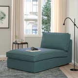 KIVIK chaise: teal, sturdy, l-shaped, soft fabric, fits well in room, near lamp.