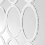 KOMPLEMENT hanger close-up, showcasing intricate design and durable materials with braided loops.