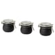 Three matching black KORKEN jars with glass tops and metal clamps, arranged in a row.