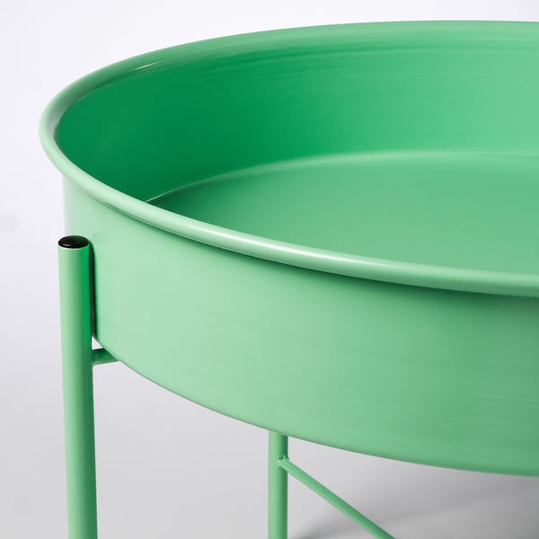 Bright green metal plant stand with round basin, sturdy legs, and sleek design.
