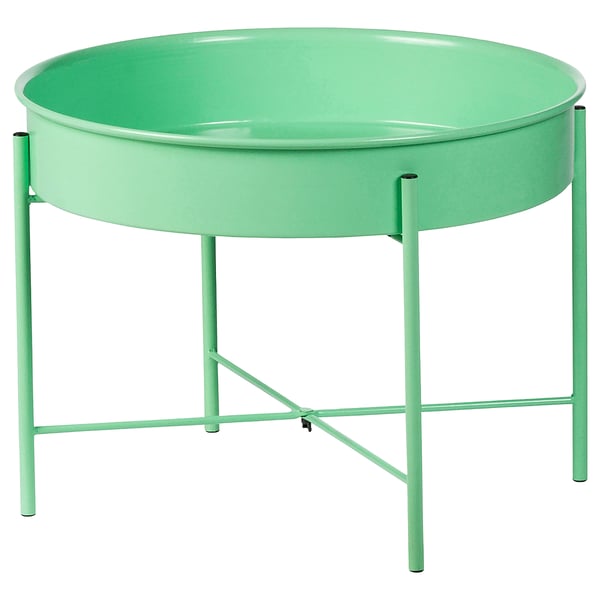 Green round ikea KULTURSKOG plant stand with metal legs and bowl.