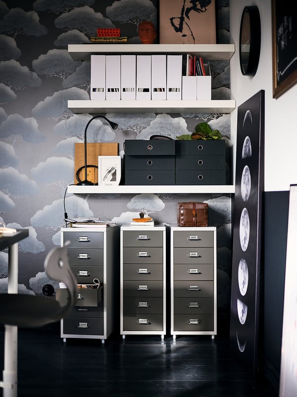 Home office with shelves, plant, decor, filing cabinets