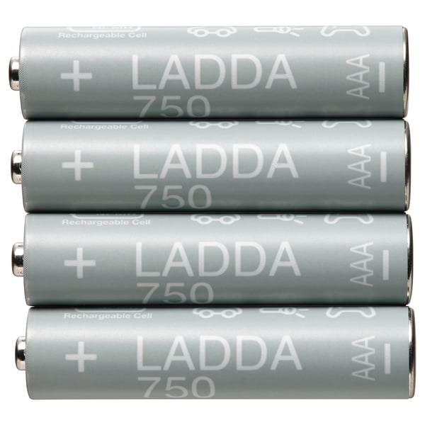 Four gray LADDA 750 rechargeable batteries stacked neatly, cylindrical shape, metallic top, white text.