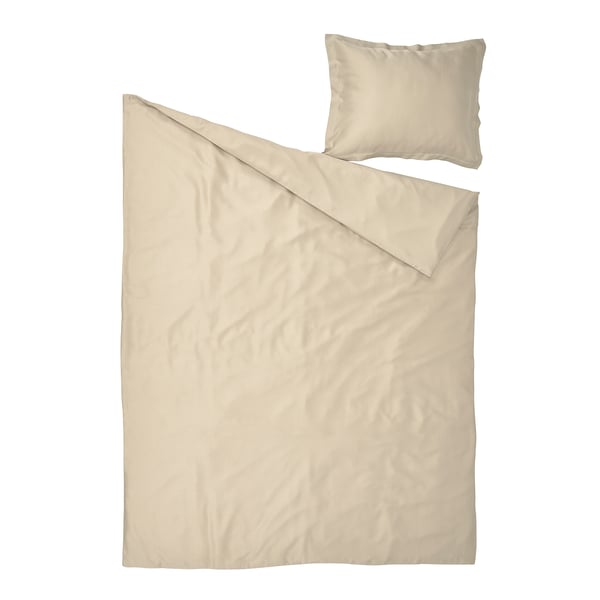 Beige bedding set: duvet and pillow, smooth lyocell, simple design.