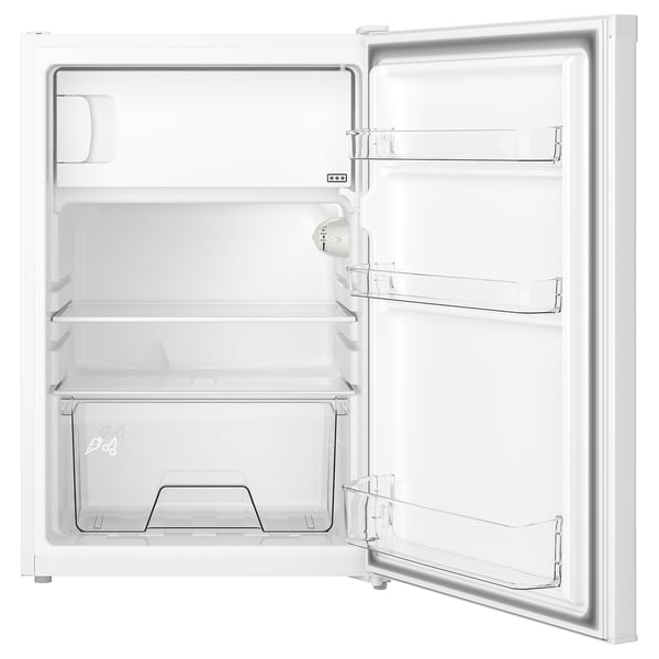 Open white mini fridge with glass shelves and clear drawers.