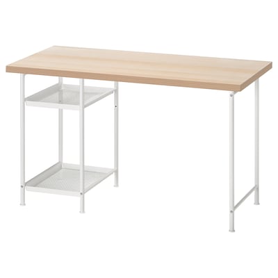An IKEA LAGKAPTEN white desk with a light wooden top, featuring two mesh shelves.