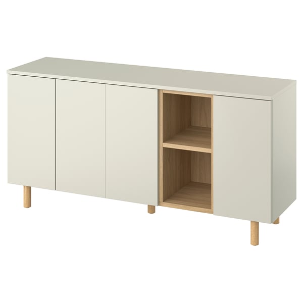 LEDAMOT cabinet, white, modern design, wooden legs, two doors, open shelves.
