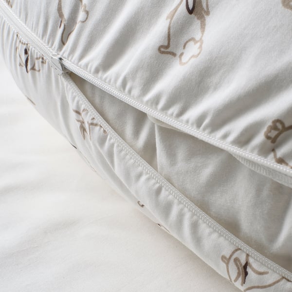 Close-up of zipper on soft cotton pillow cover, showing easy removal feature.