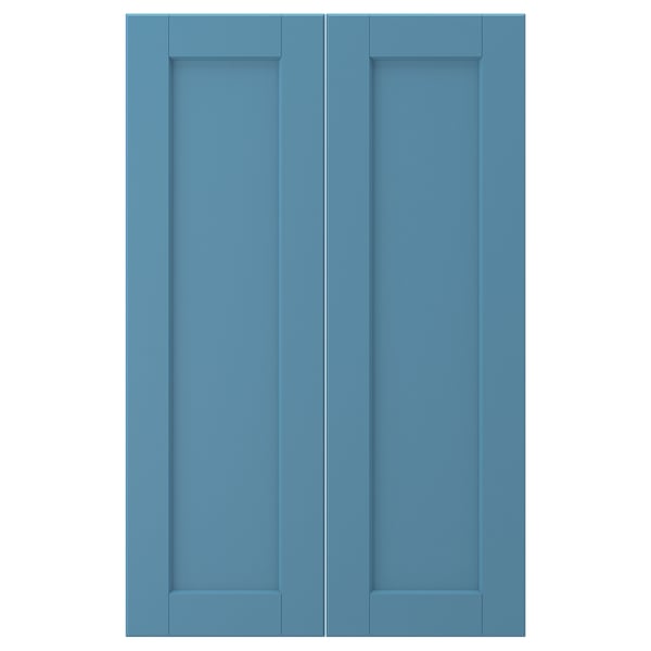 Two light blue LERHYTTAN cabinet doors with wooden panels and beveled frames.