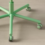 Green gaming chair base with smooth casters, sturdy design for stability.