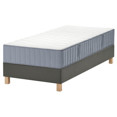 Grey LYNGÖR bed with wooden legs base and flat slats, 7 comfort zones, double pocket springs.