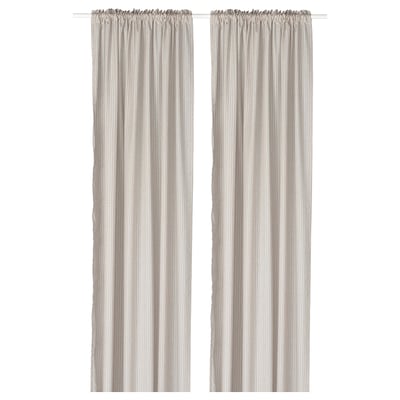 Beige and white striped curtains with heading tape, made from recycled polyester.