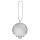 A MEDARBETARE stainless steel strainer with a long handle, designed to fit various bowl and mug sizes.
