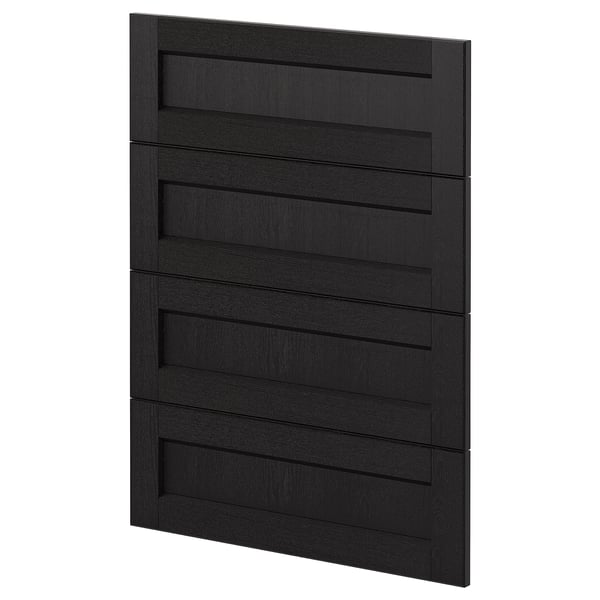 A dark wooden cabinet door with horizontal panels from ikeas METOD kitchen system.