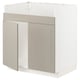 A beige METOD kitchen cabinet with a modern design and vertical grooves, featuring sturdy construction and quality materials.