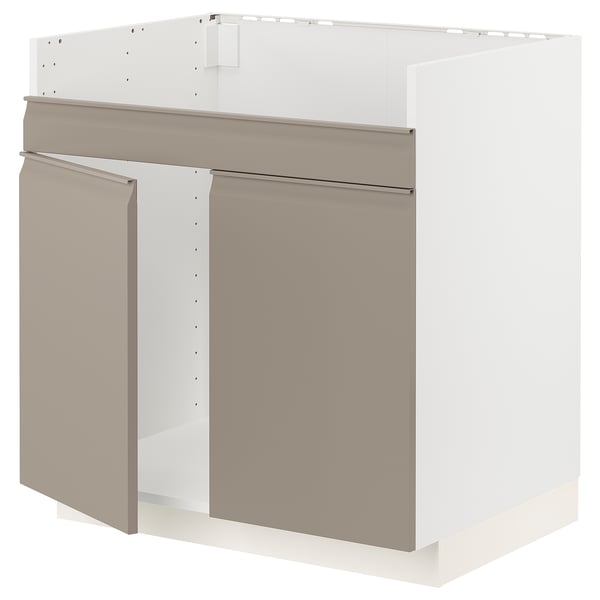 Depicts a METOD kitchen cabinet in a sleek beige color with a modern design. It a sturdy frame and smooth surfaces.