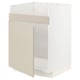 Beige METOD kitchen unit with white frame.