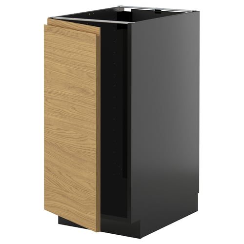 A METOD kitchen cabinet with a black and wood design, featuring a modern minimalist look.