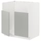 This image shows a white METOD kitchen cabinet with grey havstorp doors, featuring a sleek, modern design.