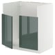 Modern white METOD kitchen unit with high-gloss green-gray doors and sleek design.