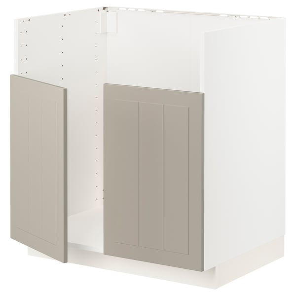 A beige METOD kitchen cabinet with a sturdy frame and snap-on hinges.